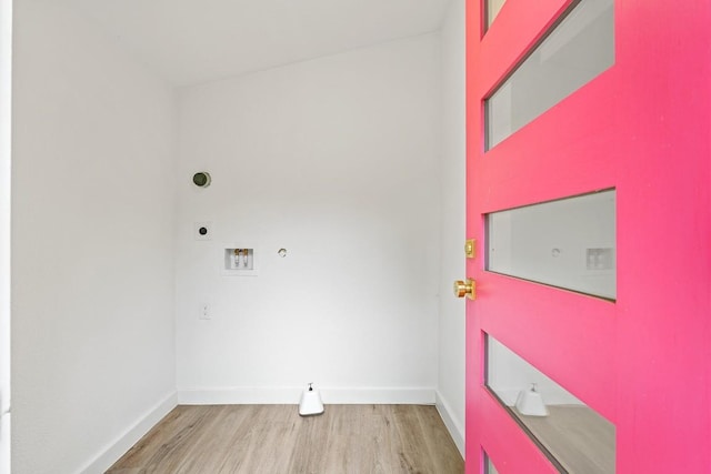 5602 Joe Sayers Ave, Austin, TX 78756 - laundry room with hookup for an electric dryer, wood finished floors, hookup for a gas dryer, and hookup for a washing machine
