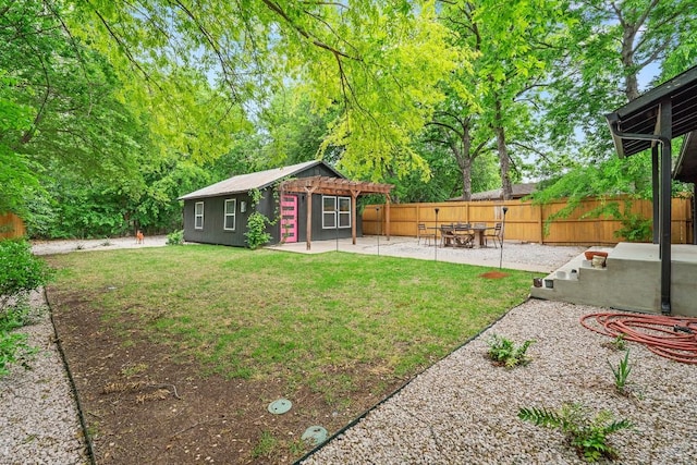 5602 Joe Sayers Ave, Austin, TX 78756 - fenced backyard featuring an outbuilding and a patio area