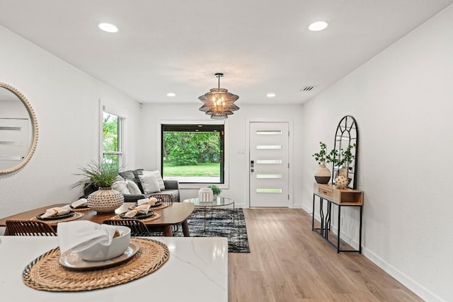 5602 Joe Sayers Ave, Austin, TX 78756 - foyer entrance with light wood-type flooring and recessed lighting