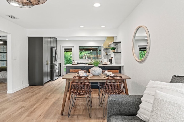 5602 Joe Sayers Ave, Austin, TX 78756 - dining room with light wood-type flooring and recessed lighting