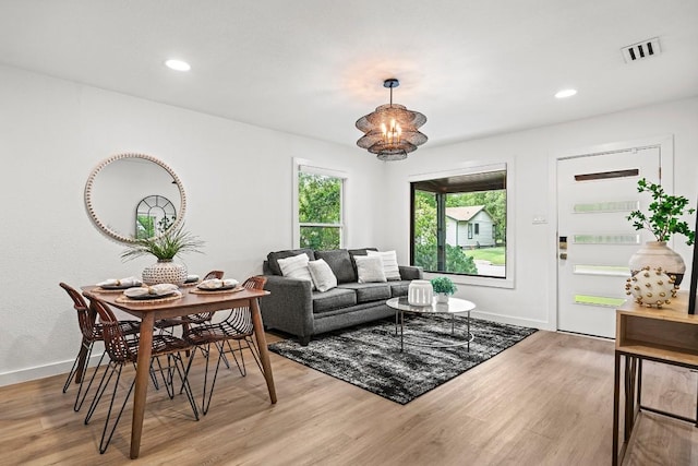 5602 Joe Sayers Ave, Austin, TX 78756 - living area with light wood finished floors and recessed lighting