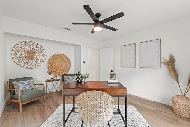5602 Joe Sayers Ave, Austin, TX 78756 - office space featuring light wood-style flooring, a ceiling fan, and ornamental molding
