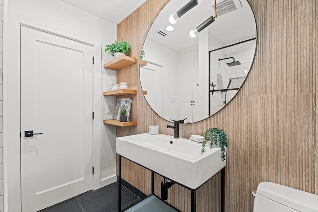 5602 Joe Sayers Ave, Austin, TX 78756 - full bath with a tile shower, tile patterned floors, and vanity