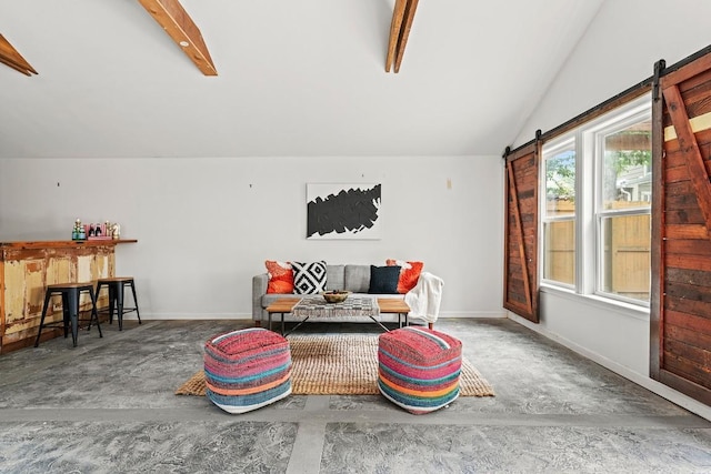 5602 Joe Sayers Ave, Austin, TX 78756 - living room with a barn door and concrete floors