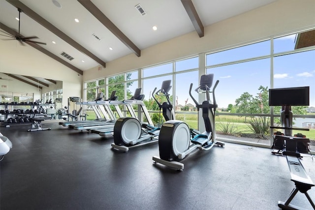 workout area with a ceiling fan, visible vents, and high vaulted ceiling