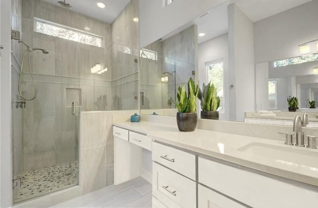 full bath with vanity, recessed lighting, and a stall shower
