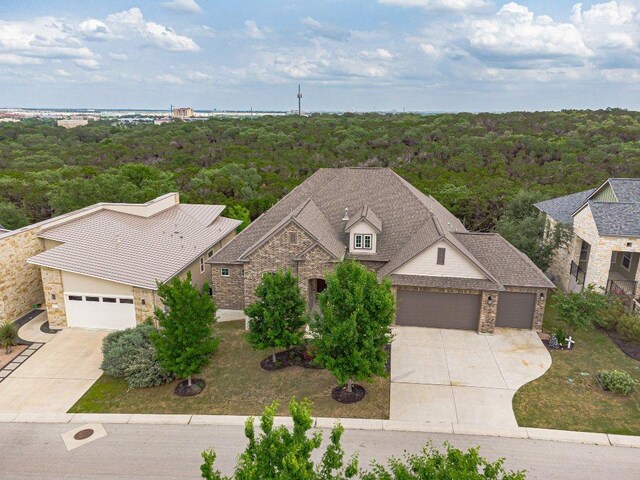 513 Freeing Oak St, San Marcos, TX 78666 - view of subject property with a heavily wooded area