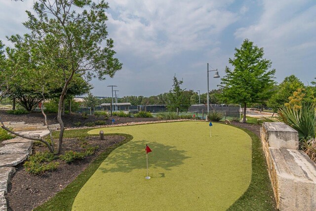 513 Freeing Oak St, San Marcos, TX 78666 - view of community with a putting green