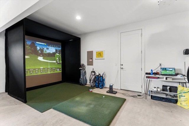 7913 Edmondson Bnd, Austin, TX 78744 - recreation room featuring golf simulator, electric panel, and carpet floors