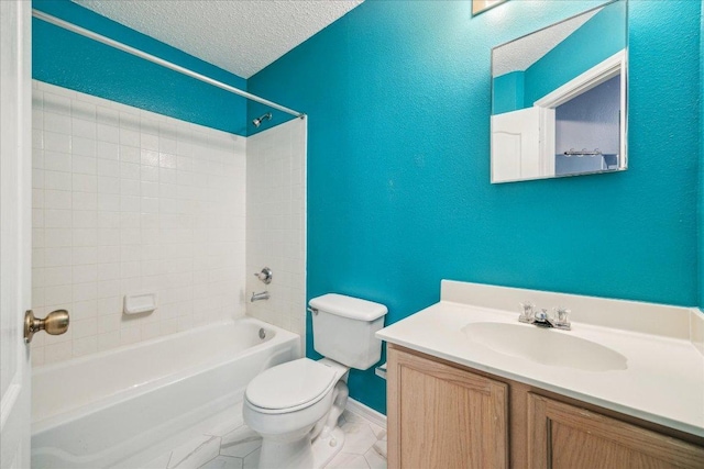 bathroom with a textured ceiling, vanity, bathtub / shower combination, baseboards, and toilet