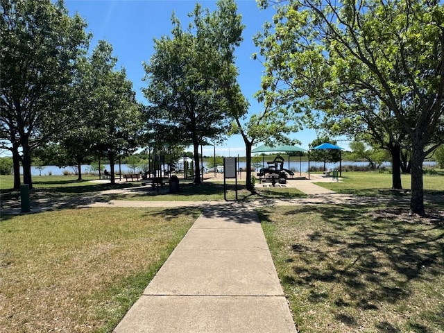 view of home's community with a lawn