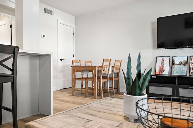 1203 Hollow Creek Dr Unit 101, Austin, TX 78704 - dining room featuring wood finished floors