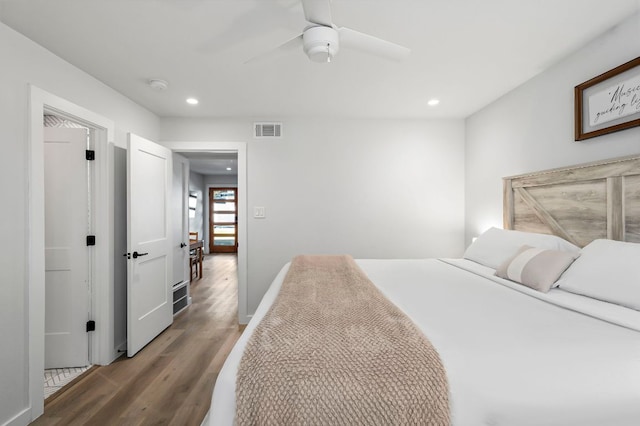 1203 Hollow Creek Dr Unit 101, Austin, TX 78704 - bedroom featuring wood finished floors, recessed lighting, and ceiling fan