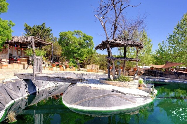 view of property's community featuring a pool