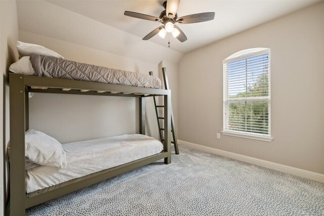 bedroom featuring a ceiling fan, baseboards, and carpet floors