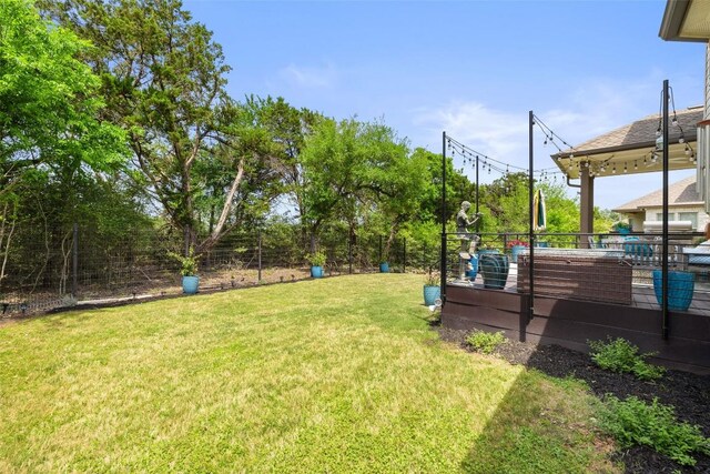 view of yard with fence