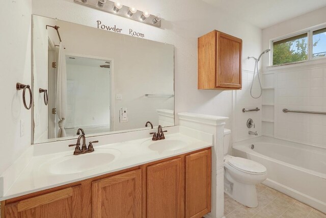 full bath featuring toilet, a sink, double vanity, and bathing tub / shower combination