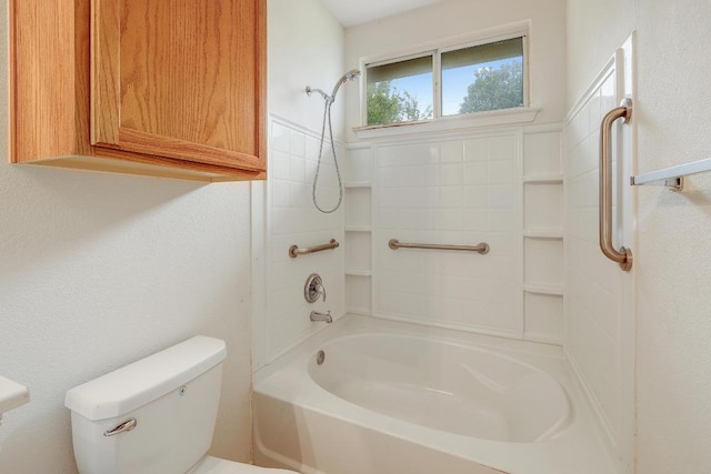 bathroom with shower / washtub combination and toilet