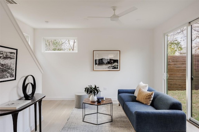 3209 Dolphin Dr Unit 2, Austin, TX 78704 - living area with wood finished floors and a ceiling fan