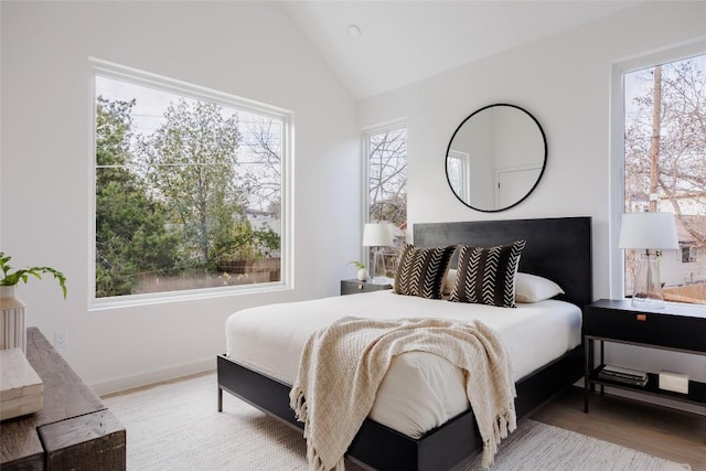 3209 Dolphin Dr Unit 2, Austin, TX 78704 - bedroom featuring lofted ceiling and wood finished floors