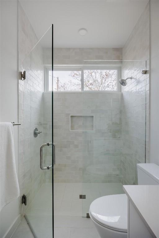 3209 Dolphin Dr Unit 2, Austin, TX 78704 - bathroom featuring a stall shower and vanity