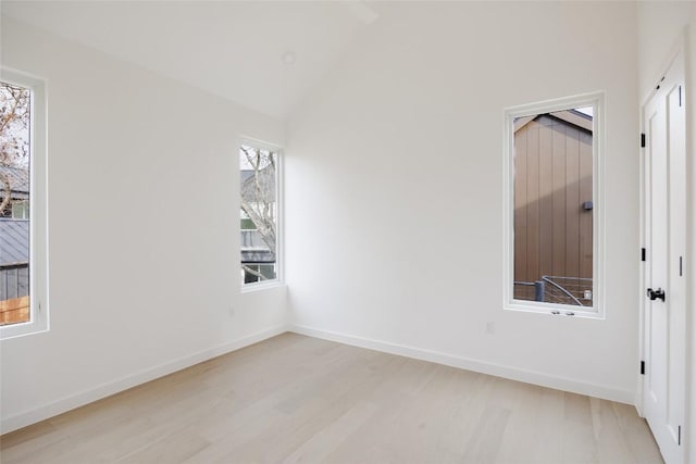3209 Dolphin Dr Unit 2, Austin, TX 78704 - unfurnished room with light wood-style floors and lofted ceiling