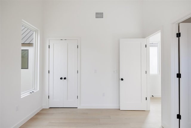 3209 Dolphin Dr Unit 2, Austin, TX 78704 - unfurnished bedroom featuring light wood-type flooring and a closet