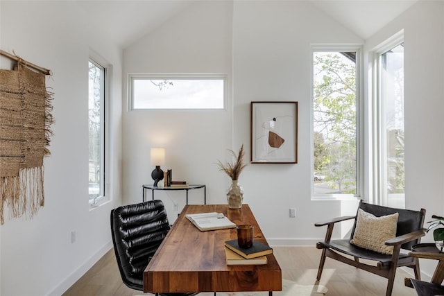3209 Dolphin Dr Unit 2, Austin, TX 78704 - office with vaulted ceiling, plenty of natural light, and light wood-style floors