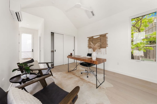 3209 Dolphin Dr Unit 2, Austin, TX 78704 - office with a wall unit AC, vaulted ceiling, light wood-style flooring, and ceiling fan