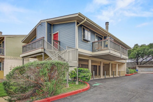 2215 Post Rd Unit 2022, Austin, TX 78704 - view of side of home with stairs