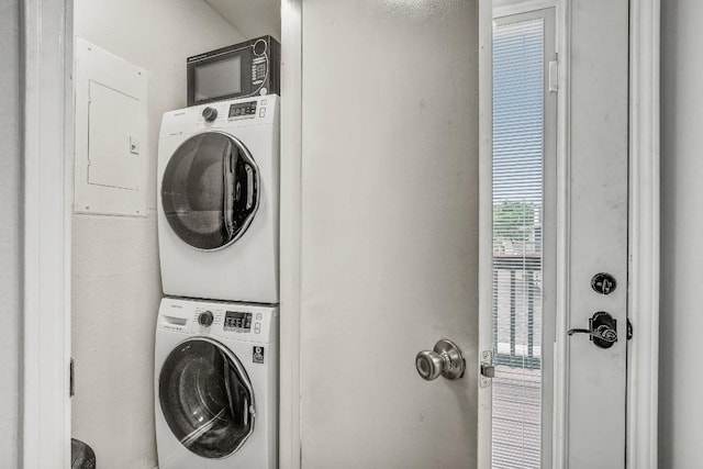 2215 Post Rd Unit 2022, Austin, TX 78704 - washroom with stacked washing machine and dryer