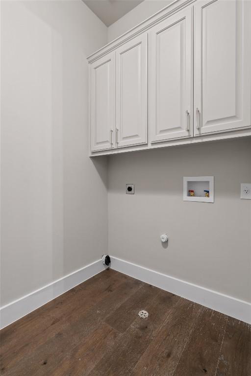8 Cove Creek Ln, Austin, TX 78738 - laundry area featuring cabinet space, dark wood-style floors, washer hookup, and electric dryer hookup