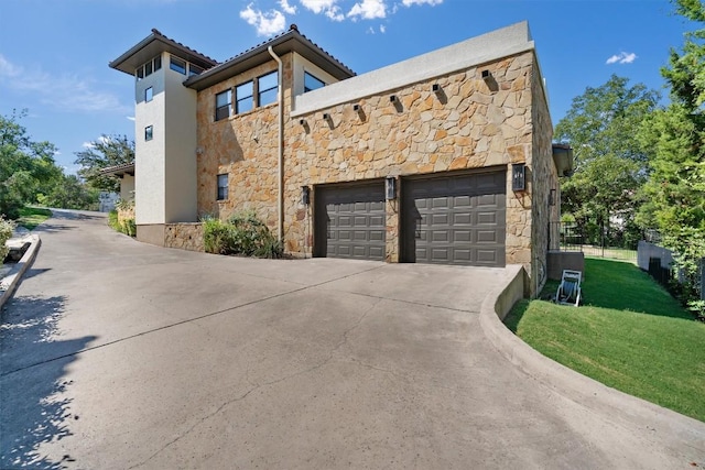 8 Cove Creek Ln, Austin, TX 78738 - view of property exterior featuring stone siding, driveway, stucco siding, and a garage