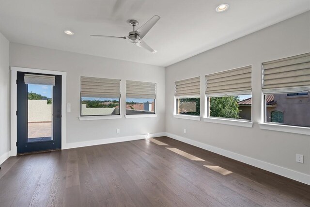 8 Cove Creek Ln, Austin, TX 78738 - spare room with a ceiling fan, dark wood finished floors, and recessed lighting