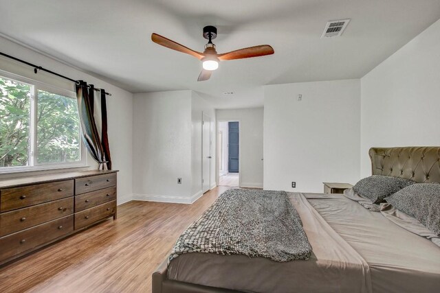 12319 Wycliff Ln, Austin, TX 78727 - bedroom featuring baseboards, light wood-type flooring, and ceiling fan