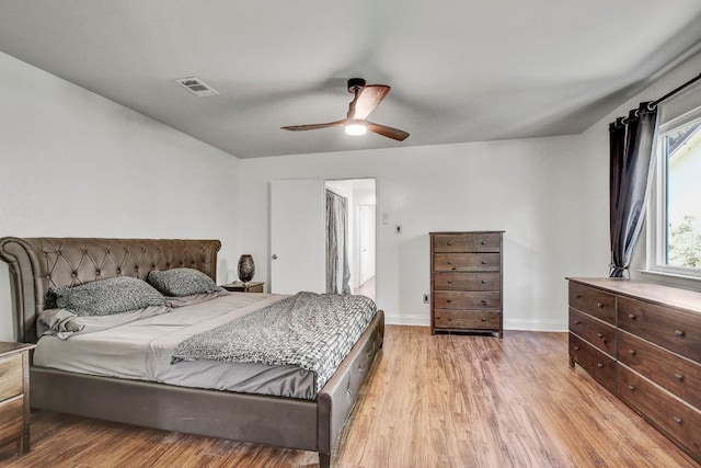 12319 Wycliff Ln, Austin, TX 78727 - bedroom featuring light wood finished floors, baseboards, and ceiling fan