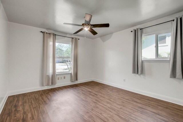 12319 Wycliff Ln, Austin, TX 78727 - unfurnished room featuring a ceiling fan, wood finished floors, and baseboards