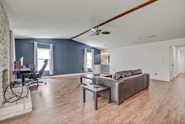 12319 Wycliff Ln, Austin, TX 78727 - living room with light wood-type flooring, vaulted ceiling, ceiling fan, an office area, and baseboards