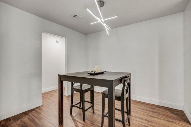 12319 Wycliff Ln, Austin, TX 78727 - dining room with light wood finished floors and baseboards