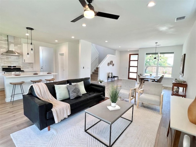 407 Delmar Ave Unit A, Austin, TX 78752 - living area featuring stairway, light wood-type flooring, ceiling fan, and recessed lighting