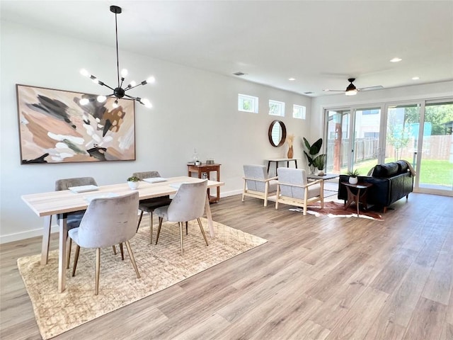 407 Delmar Ave Unit A, Austin, TX 78752 - dining area featuring light wood-style floors, recessed lighting, a chandelier, and a ceiling fan