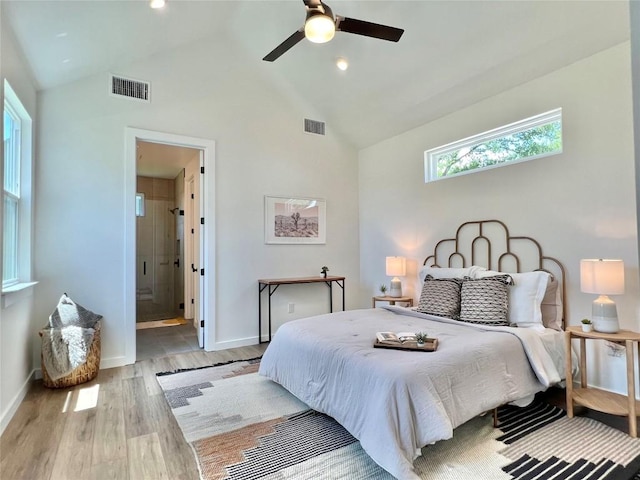 407 Delmar Ave Unit A, Austin, TX 78752 - bedroom with wood finished floors, high vaulted ceiling, connected bathroom, and a ceiling fan