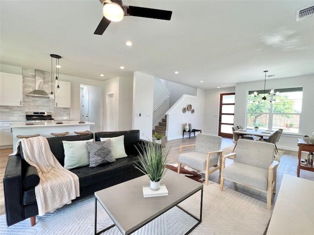 407 Delmar Ave Unit A, Austin, TX 78752 - living area featuring stairway, a ceiling fan, recessed lighting, and light wood-style flooring