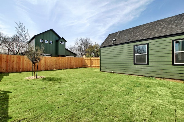 view of yard featuring a fenced backyard