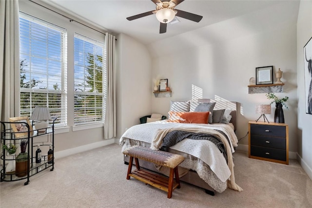 2500 Yuma Trl, Leander, TX 78641 - carpeted bedroom with multiple windows, ceiling fan, and vaulted ceiling