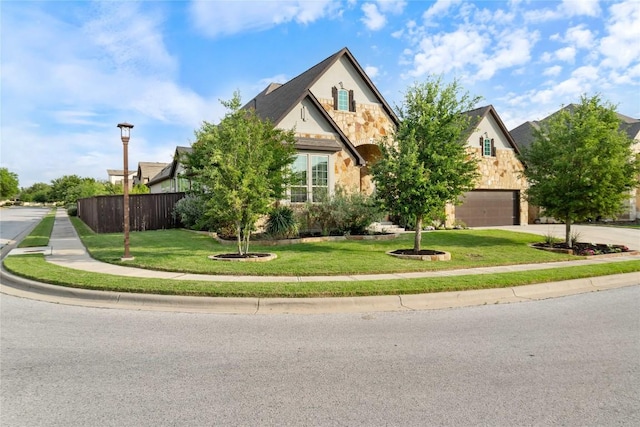 2500 Yuma Trl, Leander, TX 78641 - view of front facade with stone siding, a garage, and driveway