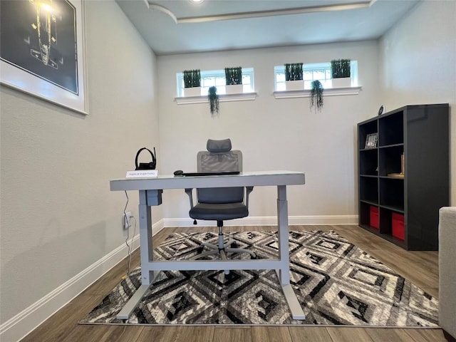 4201 Arques Ave, Round Rock, TX 78681 - office with plenty of natural light, wood finished floors, and baseboards