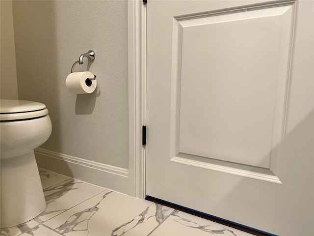 4201 Arques Ave, Round Rock, TX 78681 - bathroom with marble finish floors, toilet, and baseboards