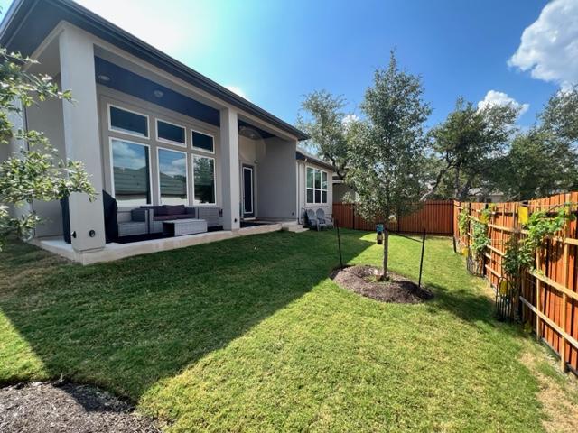 4201 Arques Ave, Round Rock, TX 78681 - rear view of house with stucco siding