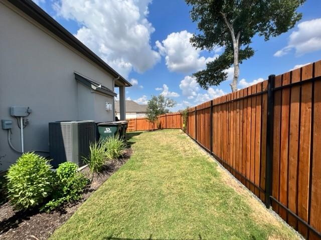 4201 Arques Ave, Round Rock, TX 78681 - view of yard with central air condition unit